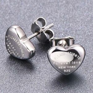 Stainless steel heart fashion earrings. Silver tone.